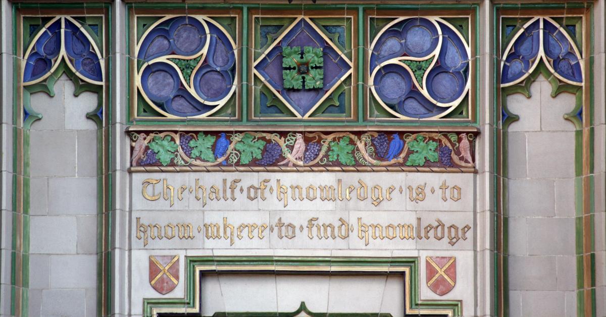 The exterior of Dodd hall, above the main door reads: "The half of knowledge is to know where to find knowledge"